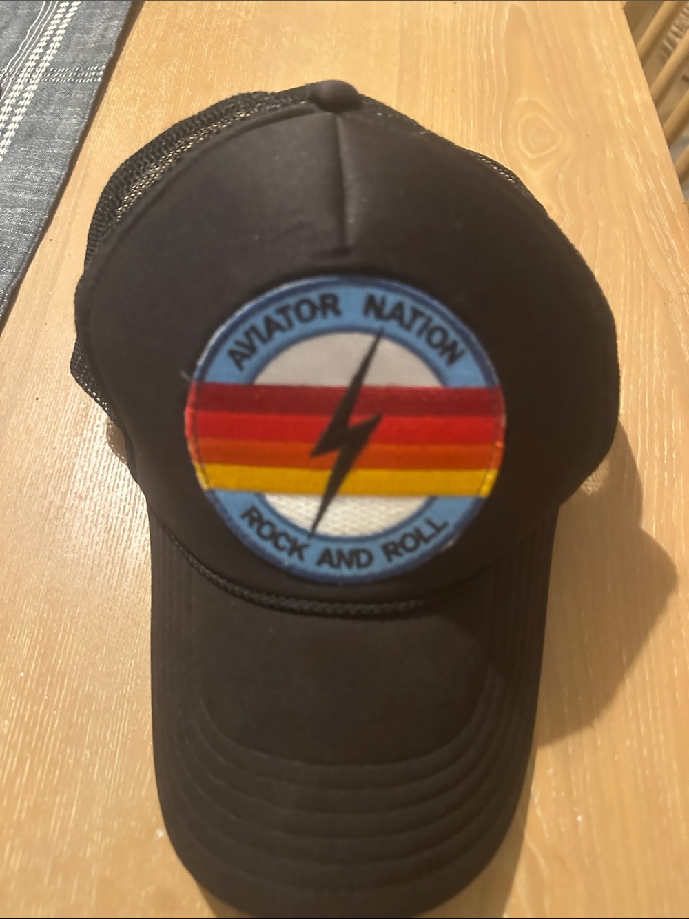 Aviator Nation Black Hat with Red-Orange-Yellow Stripe Patch